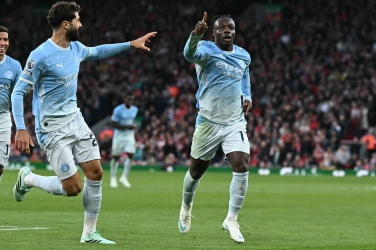 Man City silence Liverpool crowd